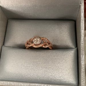 0.30 CT. T.W. composite diamond swirl bypass ring in 10k rose gold